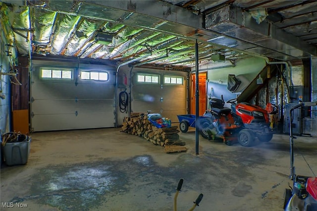 4145 Old River Rd, Philo, OH 43771 - garage featuring a garage door opener
