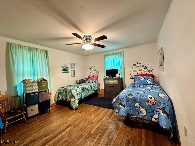 4145 Old River Rd, Philo, OH 43771 - bedroom with hardwood / wood-style floors and a ceiling fan