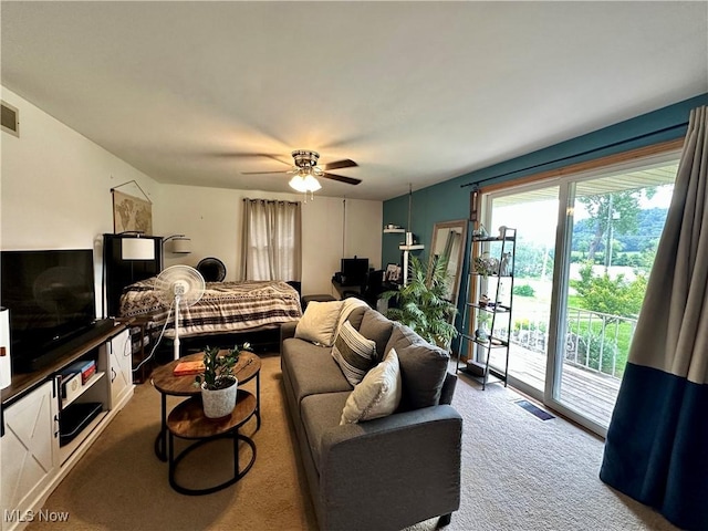 4145 Old River Rd, Philo, OH 43771 - living room featuring a ceiling fan and carpet floors