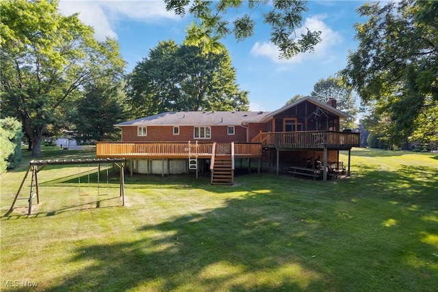 120 Vineyard Way, Doylestown, OH 44230 - rear view of house featuring stairs, a wooden deck, a lawn, and a chimney