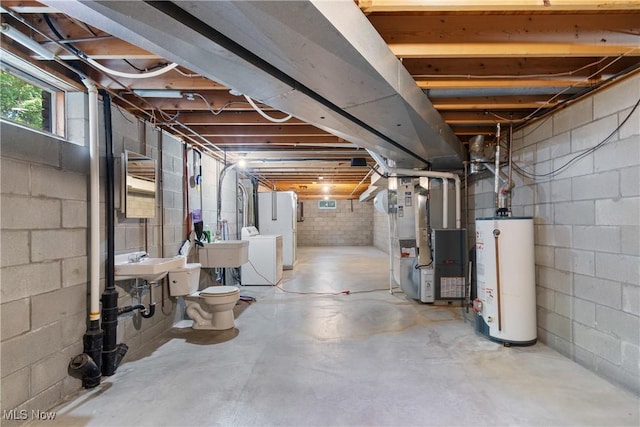 120 Vineyard Way, Doylestown, OH 44230 - basement featuring water heater, heating unit, and washer and clothes dryer