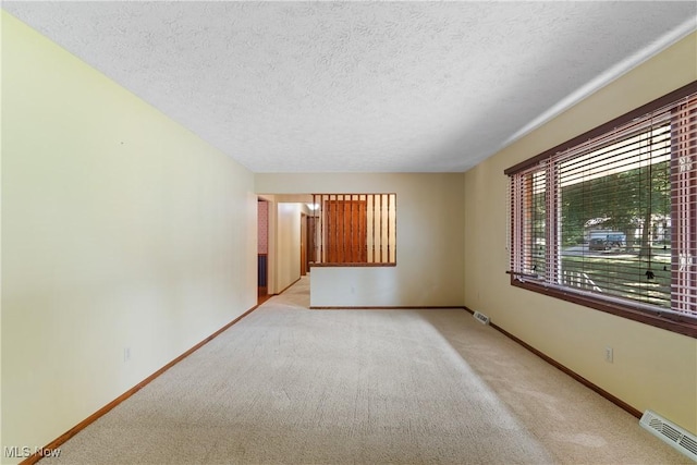 120 Vineyard Way, Doylestown, OH 44230 - carpeted spare room with a textured ceiling and baseboards