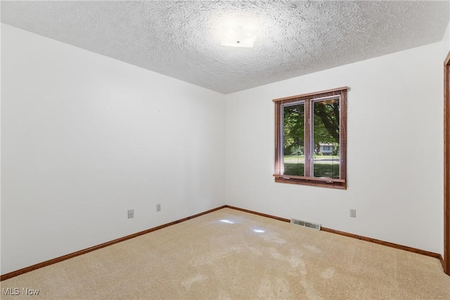 120 Vineyard Way, Doylestown, OH 44230 - carpeted empty room featuring baseboards and a textured ceiling