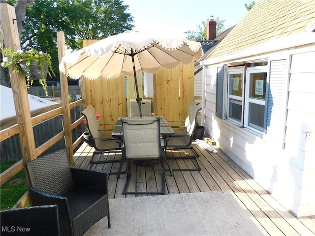3233 Wilson Ave, Ashtabula, OH 44004 - wooden terrace with outdoor dining area