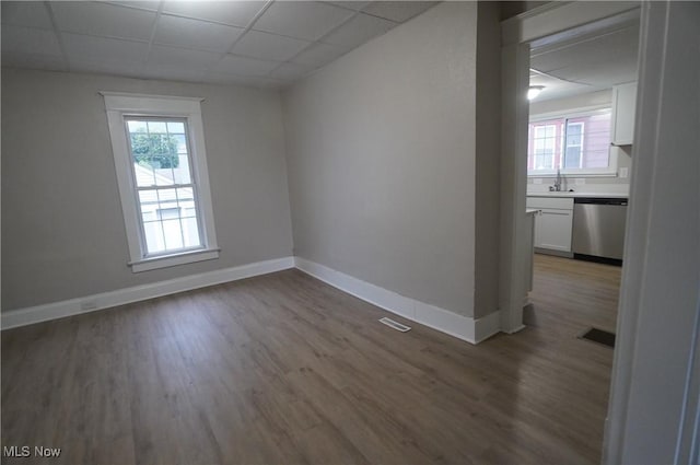 124 Peeler St, Mingo Junction, OH 43938 - unfurnished room with wood finished floors and a drop ceiling
