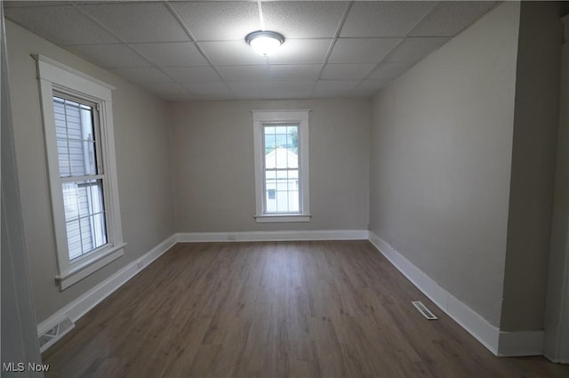 124 Peeler St, Mingo Junction, OH 43938 - unfurnished room featuring a drop ceiling and dark wood finished floors