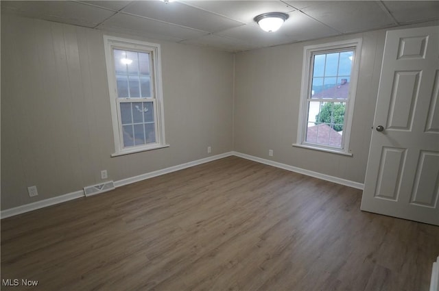 124 Peeler St, Mingo Junction, OH 43938 - unfurnished room with wood finished floors and a drop ceiling