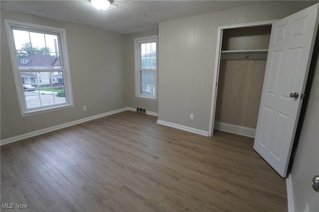 124 Peeler St, Mingo Junction, OH 43938 - unfurnished bedroom with wood finished floors and a closet