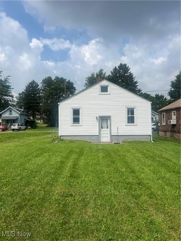 1540 Tanner Ave SW, Canton, OH 44706 - back of property featuring a lawn