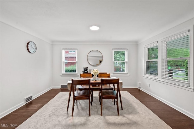 1361 Plainfield Rd, South Euclid, OH 44121 - dining area with healthy amount of natural light and dark wood-style floors