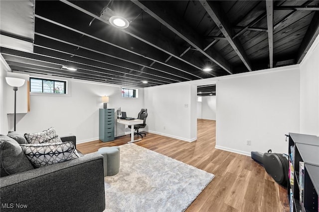 1361 Plainfield Rd, South Euclid, OH 44121 - living area with healthy amount of natural light, wood finished floors, and a desk