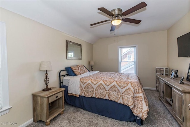 234 E 218th St, Euclid, OH 44123 - carpeted bedroom with vaulted ceiling and a ceiling fan
