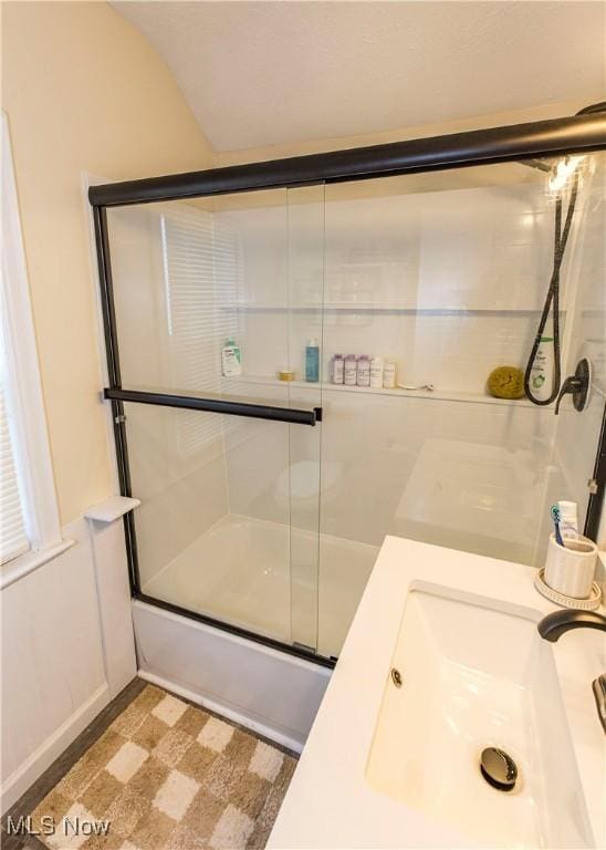 234 E 218th St, Euclid, OH 44123 - bathroom with combined bath / shower with glass door and a sink
