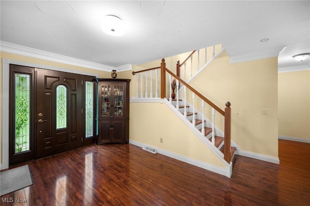 8985 Williams Rd, Chardon, OH 44024 - foyer with wood finished floors, stairs, ornamental molding, and plenty of natural light