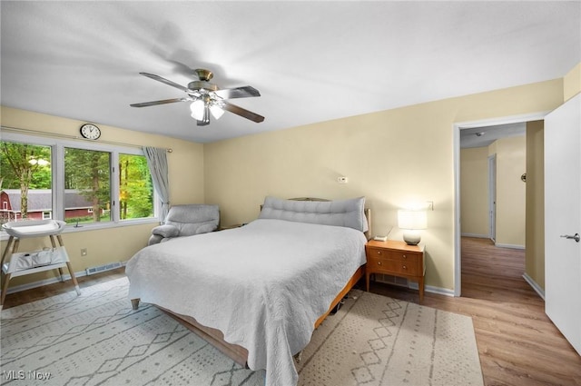 8985 Williams Rd, Chardon, OH 44024 - bedroom with wood finished floors and ceiling fan