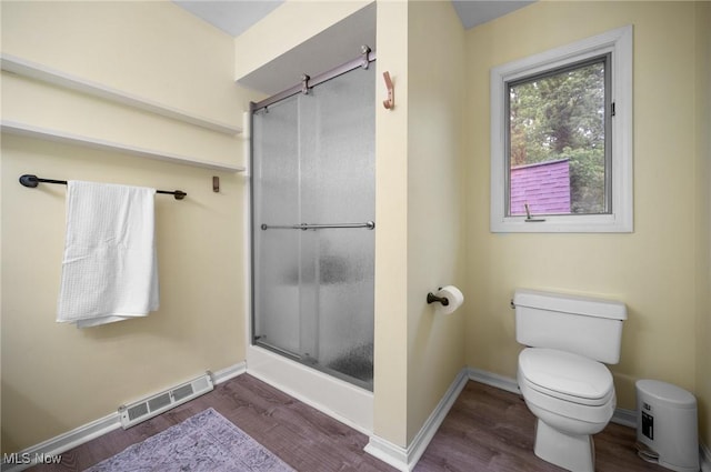8985 Williams Rd, Chardon, OH 44024 - full bath featuring a shower with door and wood finished floors