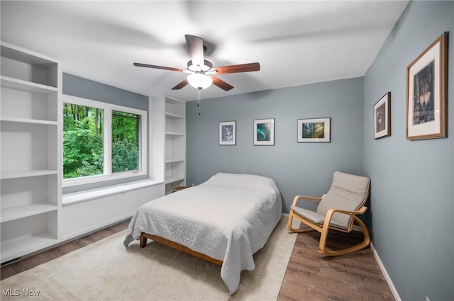 8985 Williams Rd, Chardon, OH 44024 - bedroom with wood finished floors and ceiling fan