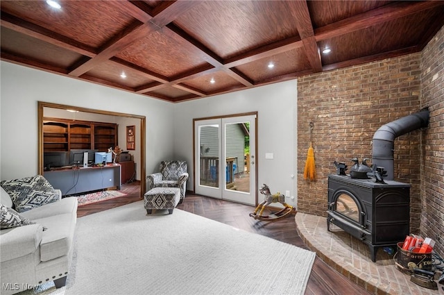 8985 Williams Rd, Chardon, OH 44024 - living room with beam ceiling, a wood stove, a desk, coffered ceiling, and recessed lighting