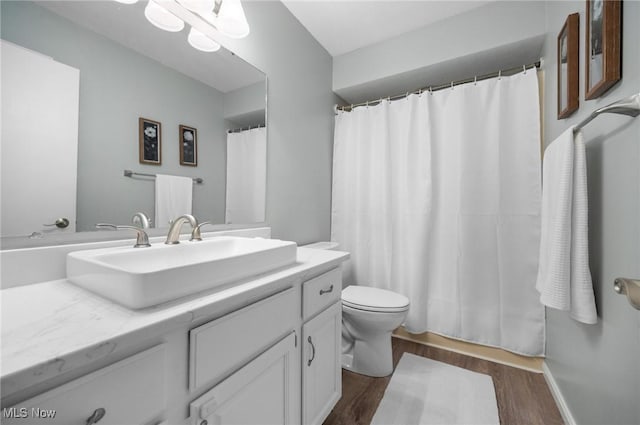 8985 Williams Rd, Chardon, OH 44024 - full bathroom with vanity and wood finished floors