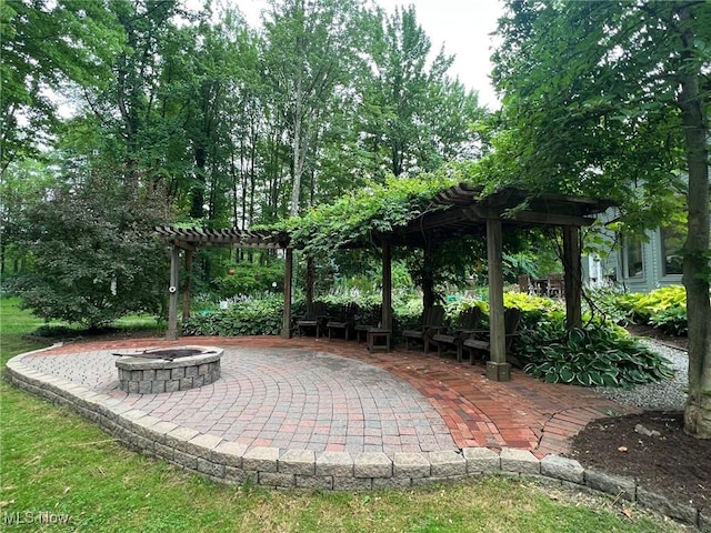 8985 Williams Rd, Chardon, OH 44024 - view of patio / terrace featuring a pergola and a fire pit