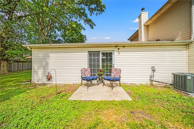 5411 W Heisley Rd, Mentor, OH 44060 - rear view of house featuring a patio area and a chimney