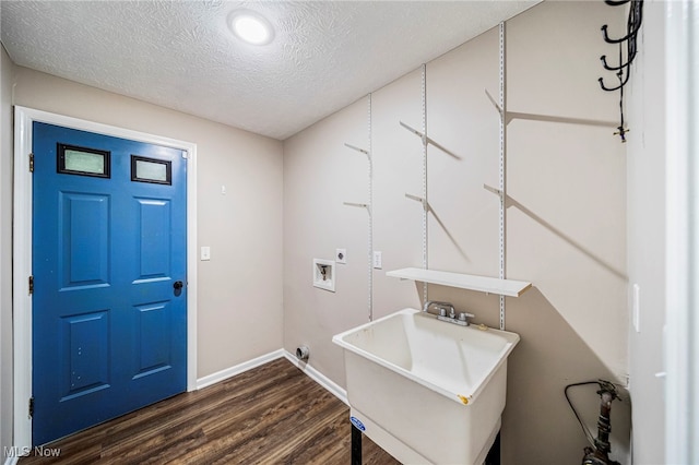 5411 W Heisley Rd, Mentor, OH 44060 - laundry area with dark wood-style flooring, a textured ceiling, and hookup for a washing machine