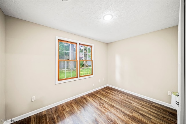 5411 W Heisley Rd, Mentor, OH 44060 - empty room featuring wood finished floors, a textured ceiling, and recessed lighting