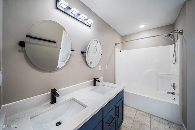 5411 W Heisley Rd, Mentor, OH 44060 - full bathroom with shower / tub combination, double vanity, tile patterned floors, and recessed lighting