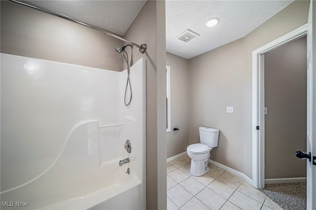 5411 W Heisley Rd, Mentor, OH 44060 - bathroom with a textured ceiling, shower / bath combination, and tile patterned flooring