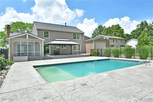 191 Maple Leaf Dr, Hubbard, OH 44425 - view of pool with a gazebo, a sunroom, and a patio area
