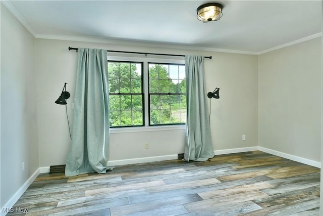 191 Maple Leaf Dr, Hubbard, OH 44425 - empty room with ornamental molding and wood finished floors