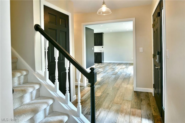 191 Maple Leaf Dr, Hubbard, OH 44425 - entryway with light wood finished floors and stairway
