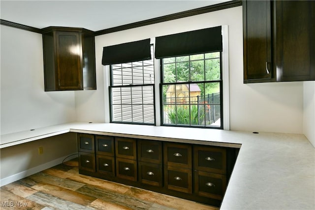 191 Maple Leaf Dr, Hubbard, OH 44425 - kitchen with light countertops, dark brown cabinetry, wood finished floors, and ornamental molding