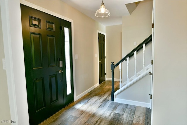 191 Maple Leaf Dr, Hubbard, OH 44425 - entryway featuring wood finished floors and stairway
