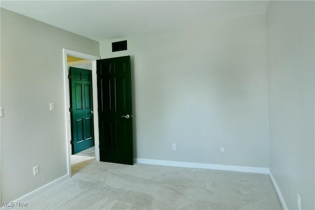 191 Maple Leaf Dr, Hubbard, OH 44425 - carpeted empty room with baseboards