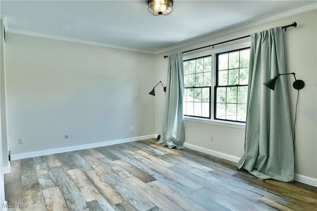 191 Maple Leaf Dr, Hubbard, OH 44425 - spare room featuring crown molding and wood finished floors
