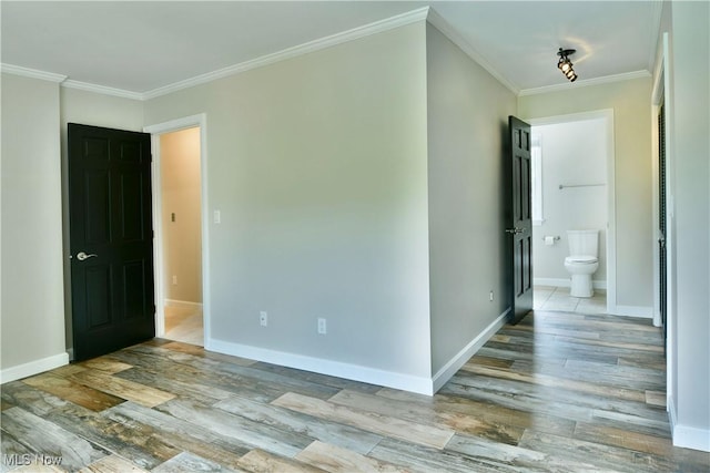 191 Maple Leaf Dr, Hubbard, OH 44425 - empty room with wood finished floors and crown molding