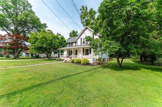 128 Forest Hill Dr, Avon Lake, OH 44012 - view of front facade featuring covered porch and a front lawn