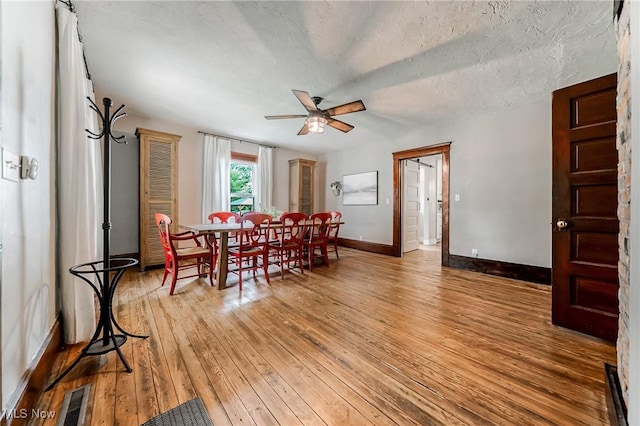 128 Forest Hill Dr, Avon Lake, OH 44012 - dining area featuring a ceiling fan and light wood-type flooring
