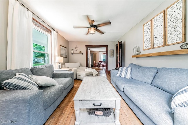 128 Forest Hill Dr, Avon Lake, OH 44012 - living room featuring ceiling fan and wood finished floors