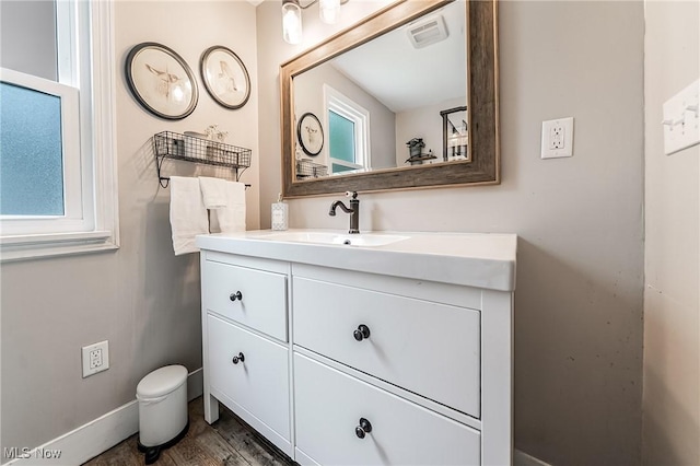 128 Forest Hill Dr, Avon Lake, OH 44012 - bathroom featuring vanity and wood finished floors