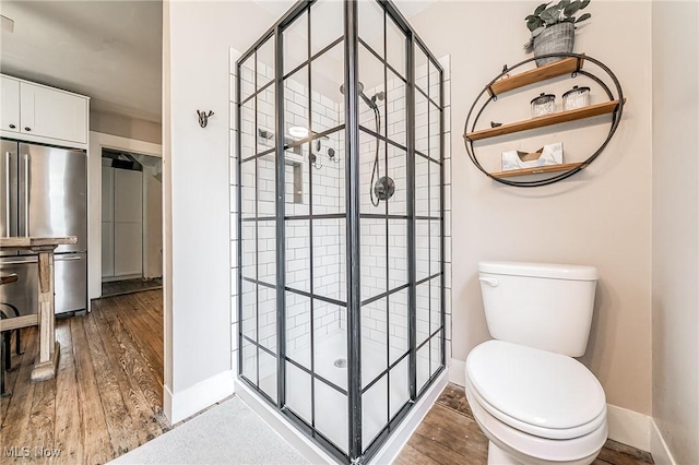 128 Forest Hill Dr, Avon Lake, OH 44012 - full bathroom with wood finished floors and a stall shower