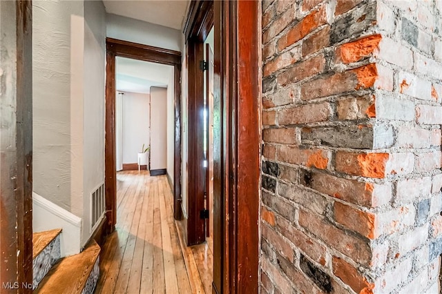 128 Forest Hill Dr, Avon Lake, OH 44012 - corridor featuring hardwood / wood-style flooring