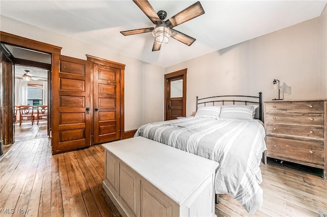 128 Forest Hill Dr, Avon Lake, OH 44012 - bedroom featuring light wood-style floors and ceiling fan