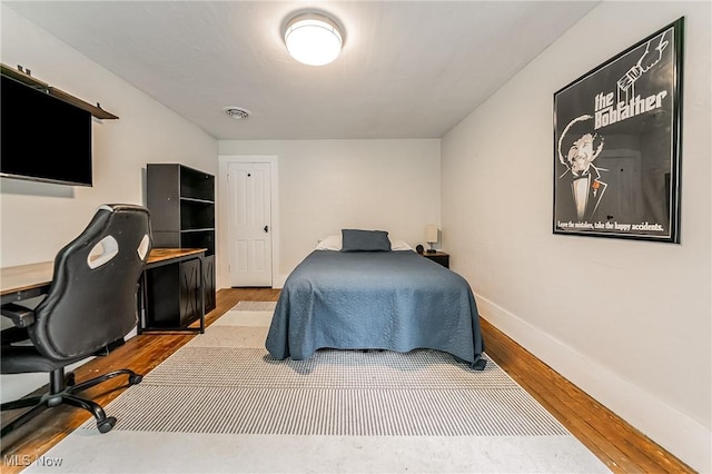 128 Forest Hill Dr, Avon Lake, OH 44012 - bedroom with wood finished floors and a desk