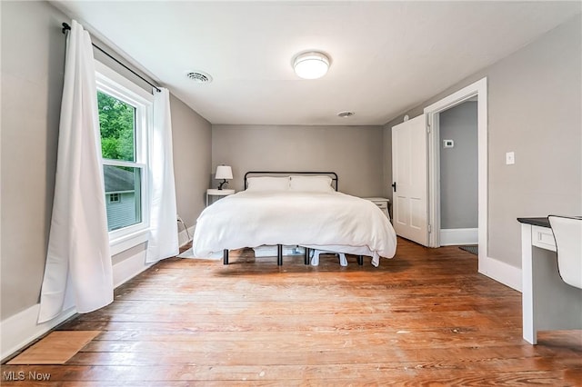 128 Forest Hill Dr, Avon Lake, OH 44012 - bedroom with wood-type flooring