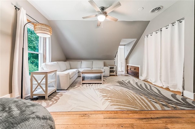 128 Forest Hill Dr, Avon Lake, OH 44012 - bedroom with lofted ceiling and hardwood / wood-style flooring