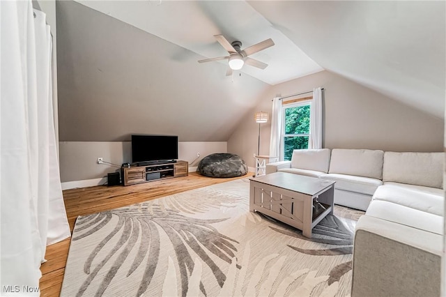 128 Forest Hill Dr, Avon Lake, OH 44012 - living room with wood finished floors, vaulted ceiling, and ceiling fan