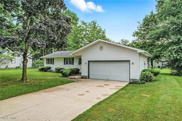 114 Corrin Cir, Cortland, OH 44410 - ranch-style house featuring a front yard, a garage, and driveway