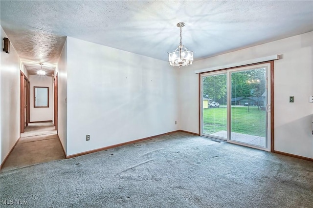 114 Corrin Cir, Cortland, OH 44410 - carpeted empty room with a chandelier and a textured ceiling
